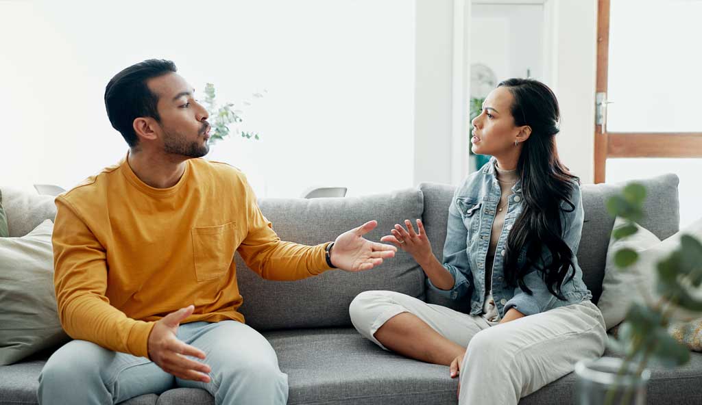 Couple talking with a licensed therapist during a couples counseling session in Charlotte, NC